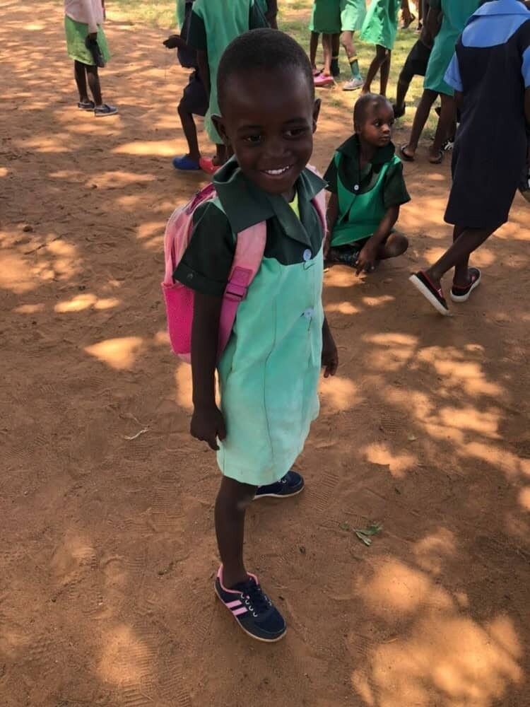 Children at Dakamela Primary School walking in their new shoes